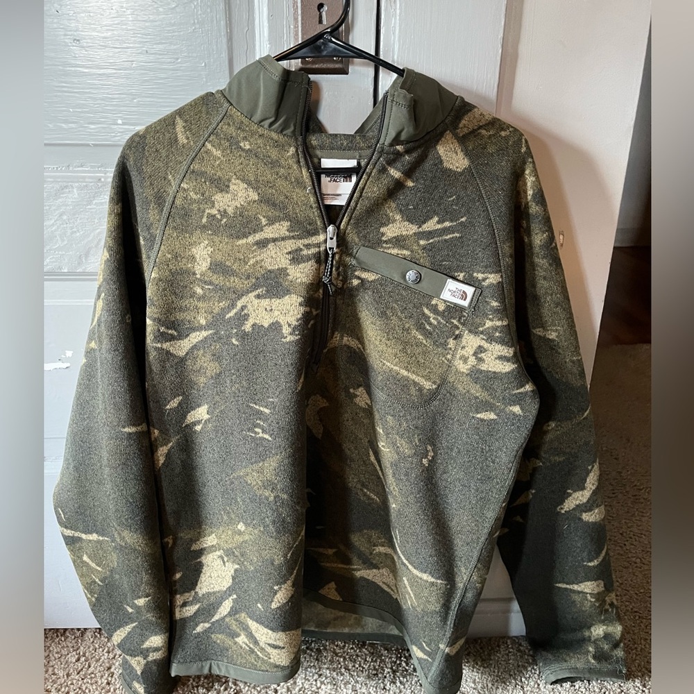 The North Face camo quarter zip. Size medium and barely worn!